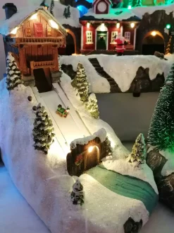 Scène de Noel – enfant sur luge